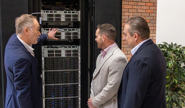 Telecoms tower next to a tennis court