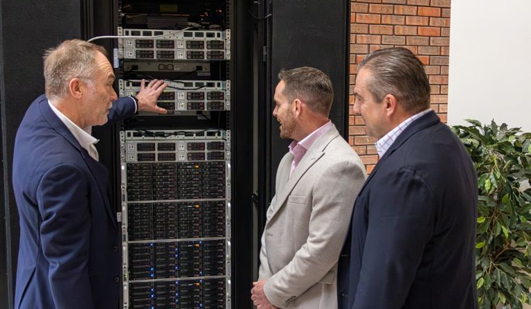 Telecoms tower next to a tennis court