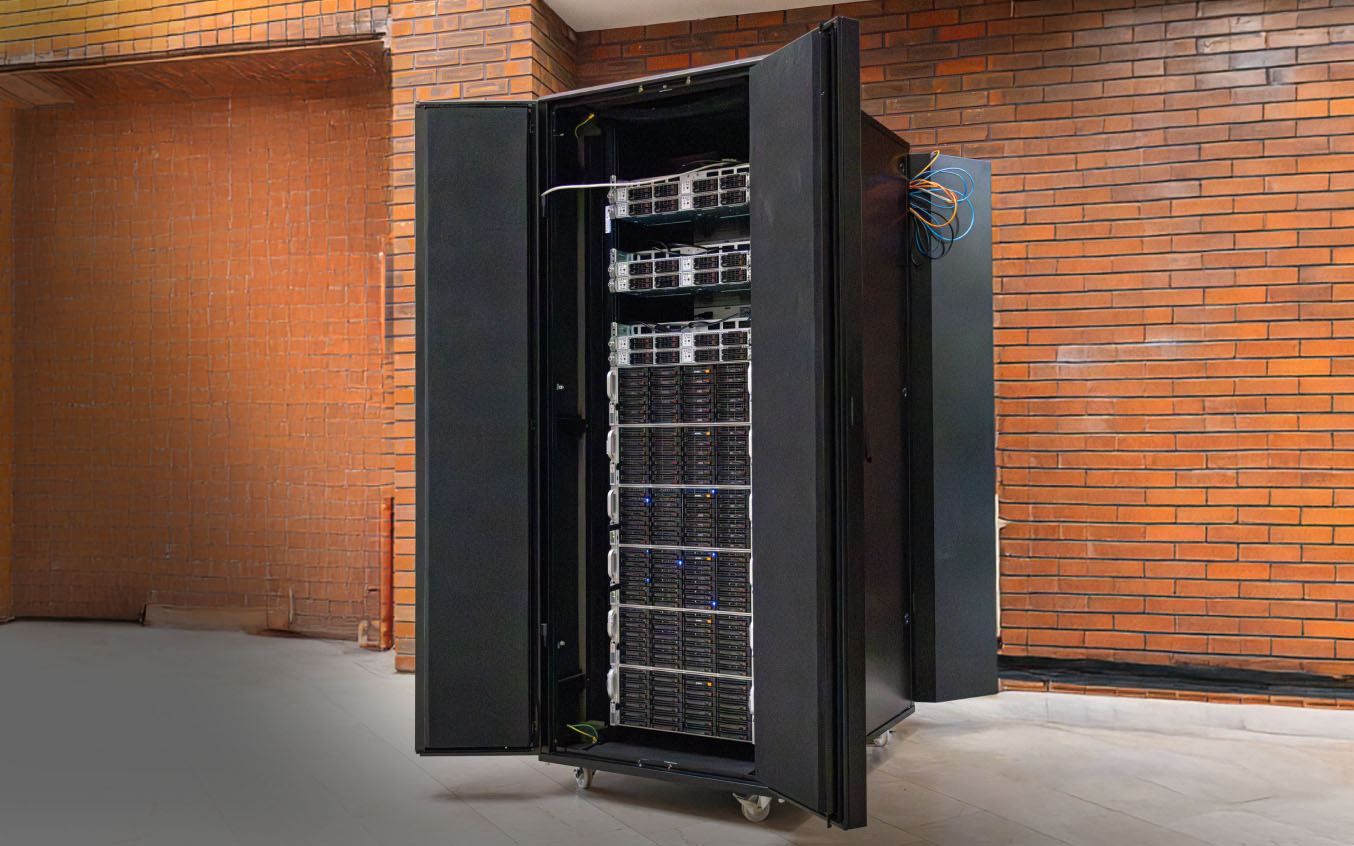 Man fixing server with screwdriver